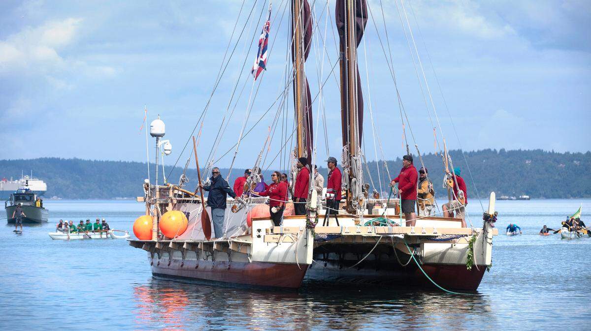 The Polynesian voyaging canoe, Hokule’a, arrives at the Thea Ross Waterway in Tacoma, Washington, on Wednesday, Aug. 30, 2023. The canoe and its crew are part of a four-year circumnavigation of the Pacific Ocean that began June 15 in Juneau, Alaska.