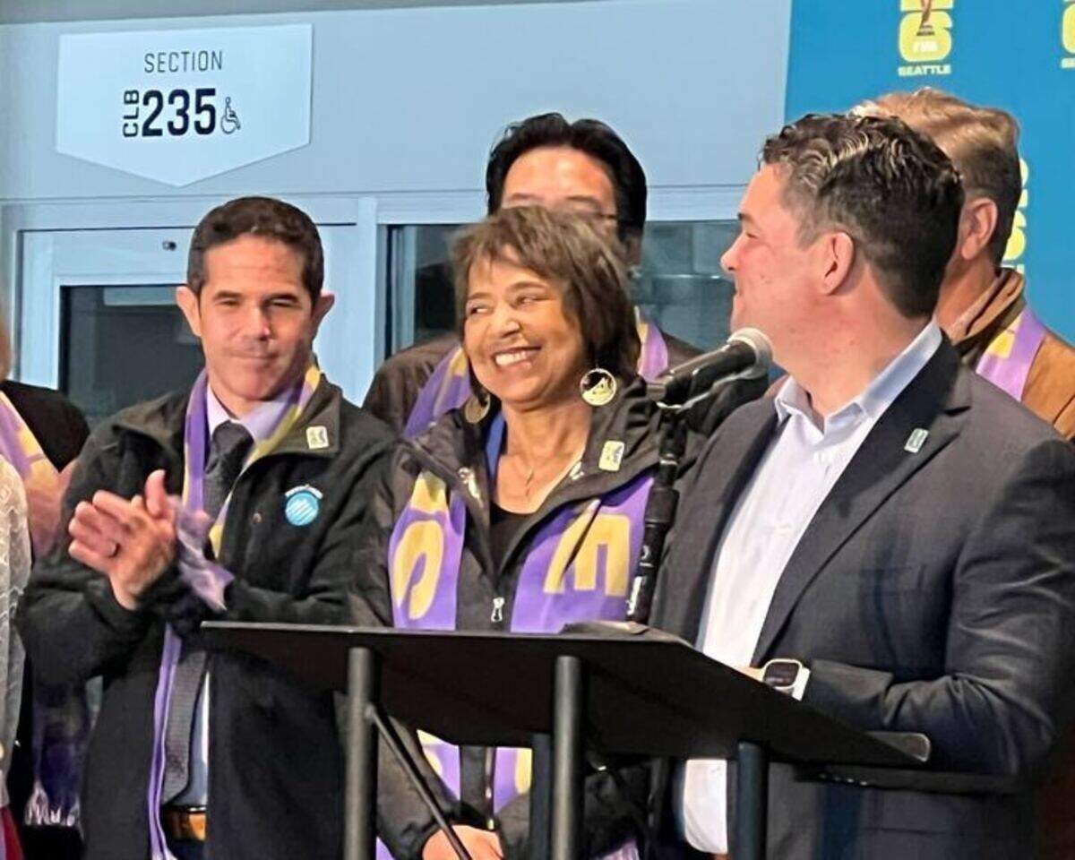 Tacoma Mayor Victoria Woodards (middle) and Pierce County Executive Ryan Mello (left) speak at the formal announcement of Tacoma’s fan zone for FIFA World Cup 2026 at Lumen Field on Jan. 14, 2025, in Seattle, Wash.