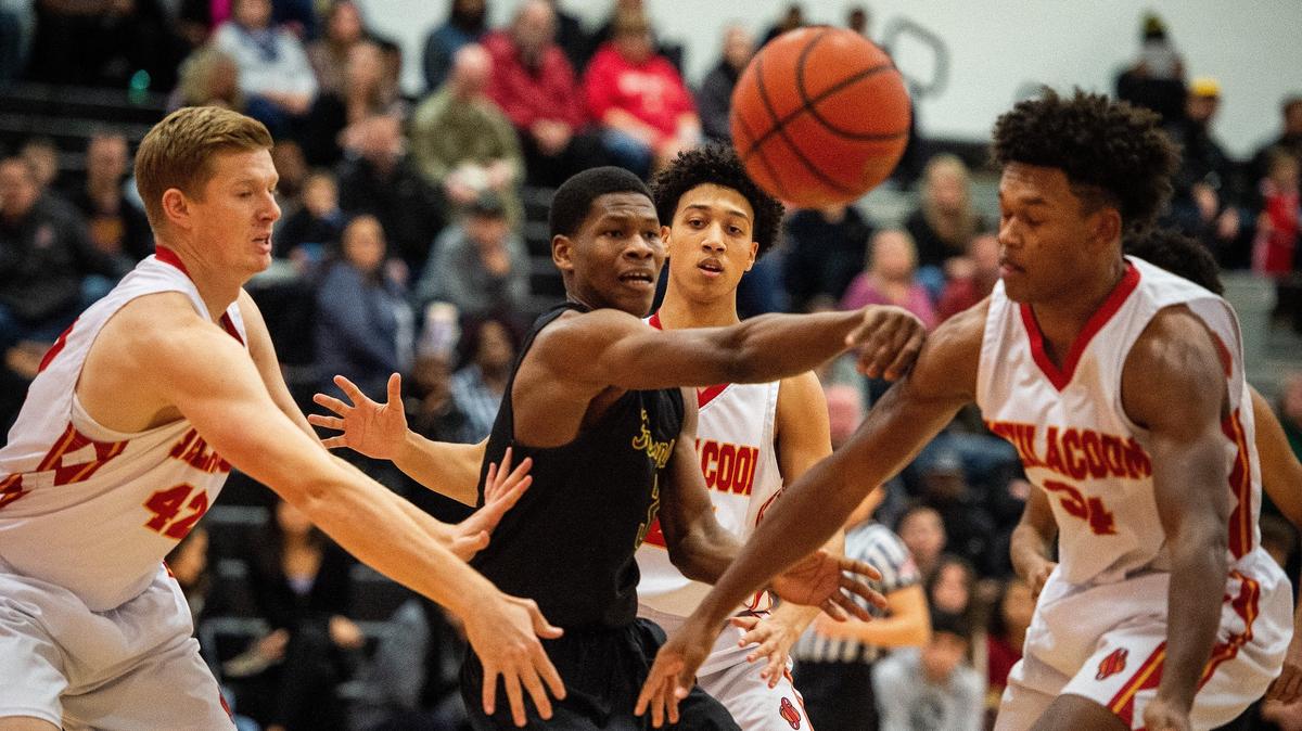 Foss’ Micah Pollard (3) passes out of heavy defense in the first quarter. Foss played Steilacoom in a basketball game at Steilacoom High School in Steilacoom, Wash., on Tuesday, Dec. 18, 2018.