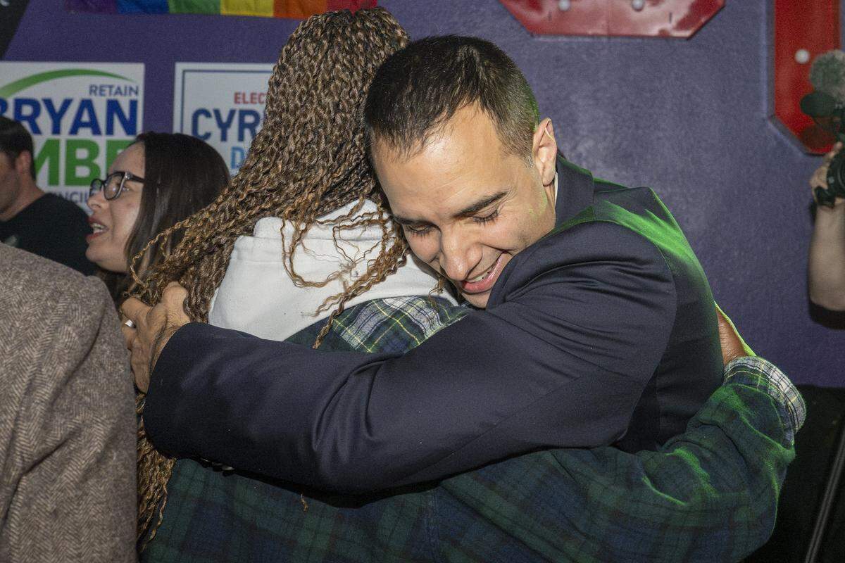 Anders Ibsen embraces supporters as he leads the race to become Tacoma’s next mayor on Tuesday, Nov. 4, 2025, in Tacoma, Wash.
