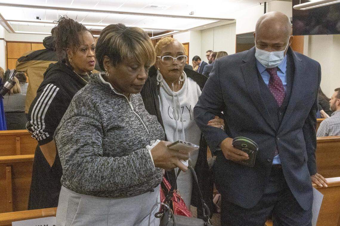 Manny Ellis’s mother, Marcia Carter-Patterson, second from right, is escorted out of court by family attorney James Bible right, and other family members after Pierce County Judge Bryan Chushcoff reads the verdict from the jury for the killing of Manny Ellis in Pierce County Superior Court Thursday, December 21, 2023. All three of the officers, Timothy Rankine, Christopher “Shane” Burbank and Matthew Collins were declared not guilty for for any charges related to the March 2020 killing of Manny Ellis.