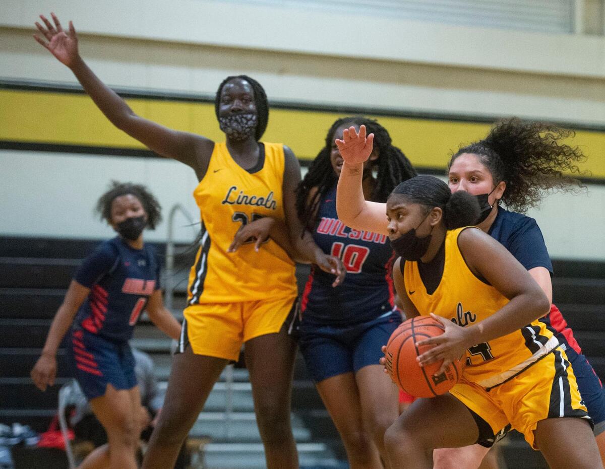 Lincoln’s Malani Warren finds an open lane. The Lady Abes routed the Wilson Rams, 85-46, in a crosstown rivalry game on their home court in Tacoma on Friday, May 21, 2021.