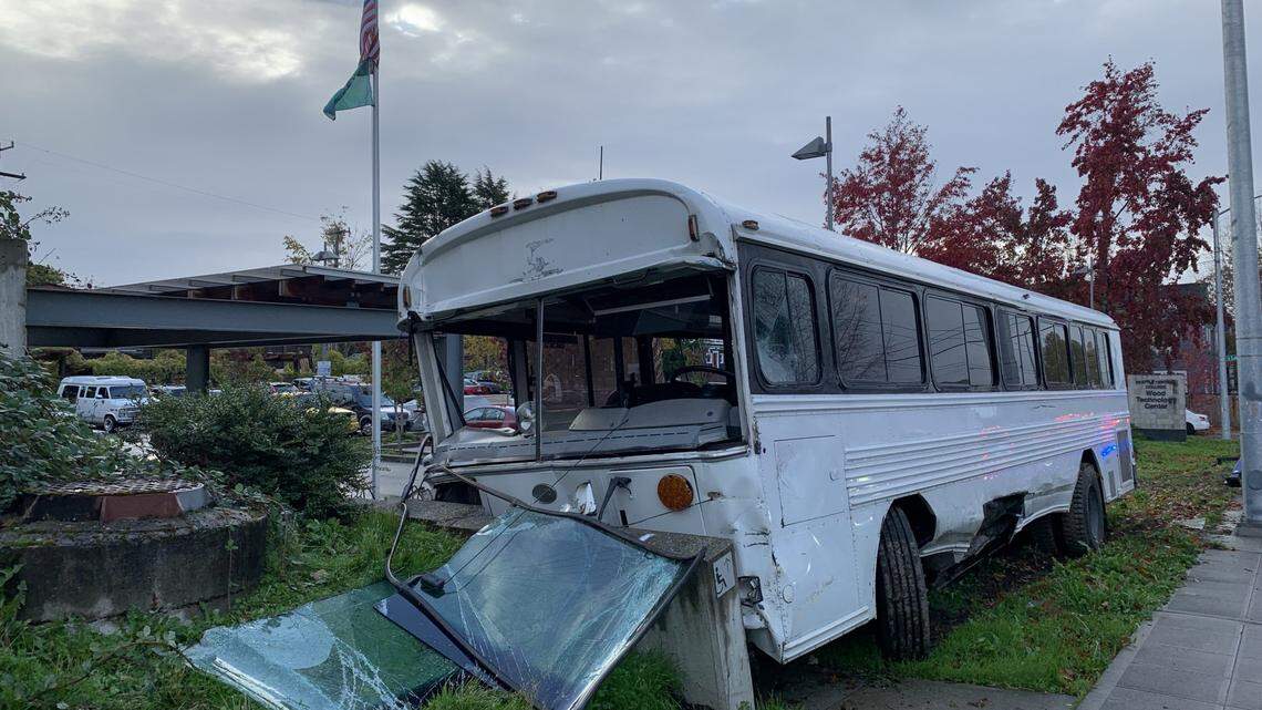 A bus service worker crashes an empty 33,000 pound school bus after stealing it on Oct. 26, 2021, in Seattle, police said. The employee was not authorized to drive the bus when he rammed it into multiple cars.