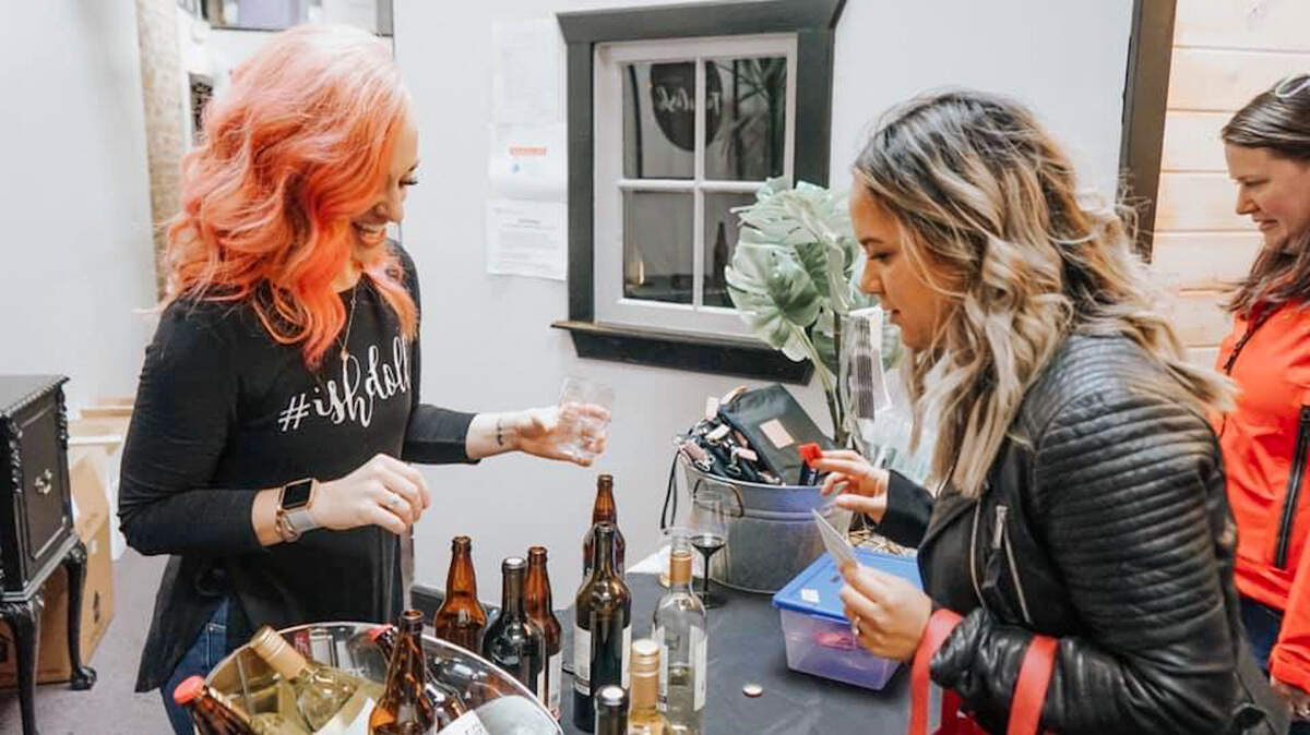 Katelyn Corrado from Salon ISH, left, and a SIP Puyallup attendee, right, in 2019.