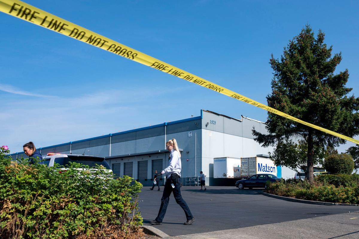 Personnel from the Tacoma Police Department investigate the scene of a homicide on the 1500 block of St. Paul Avenue on Thursday, Sept. 15, 2022, in Tacoma, Wash.