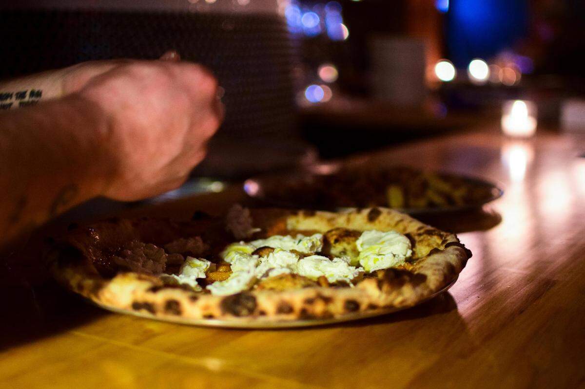 Bar Rosa opened in Tacoma’s Hilltop District in November 2021. With an Italian wood-burning oven as its only cooking surface, the food focuses on Neapolitan pizzas accompanied by amaro-centric cocktails.