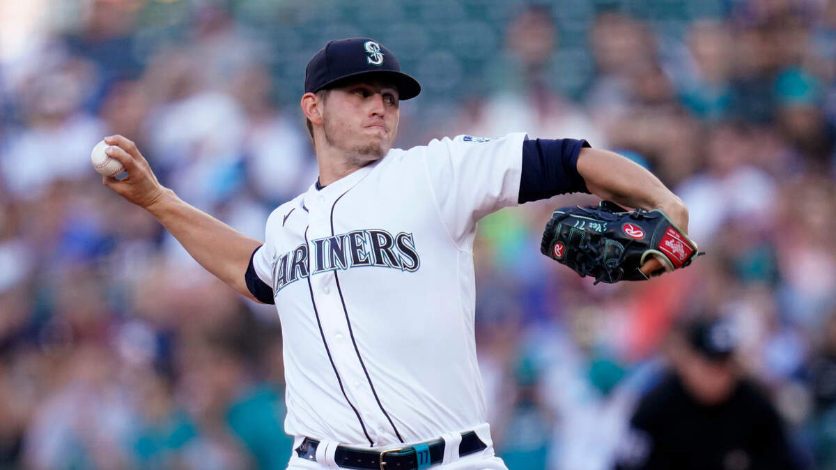 Seattle Mariners starting pitcher Chris Flexen throws to a Los Angeles Angels batter during the first inning of a baseball game Saturday, July 10, 2021, in Seattle. (AP Photo/Elaine Thompson)