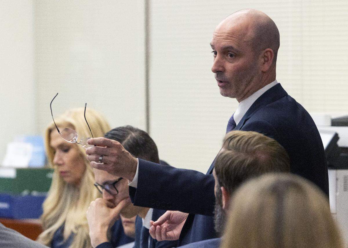 After prosecuting attorney Patty Eakes, not pictured, asks defendant Timothy Rankine if he had three days to speak with counsel before making his statement about the killing of Manny Ellis, defense attorney Jarred Ausserer talks about possibly asking the judge for a mistrial because of the question. The judge ruled against both a mistrial and a dismissal of the case.