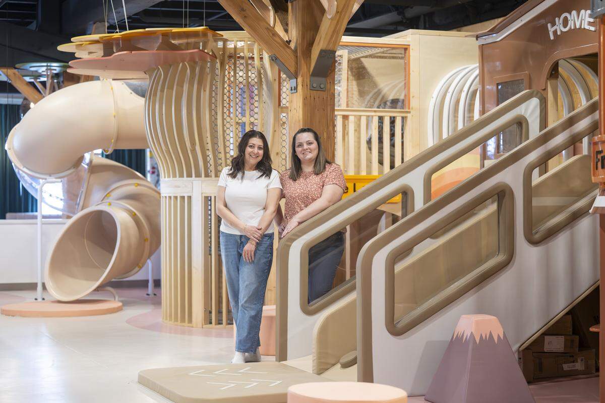 Co-owners Jordan Zenisek, left, and Susan Saccone stand in the playscape at Sunrise Play Cafe on Thursday, March 26, 2026, in Tacoma, Wash.