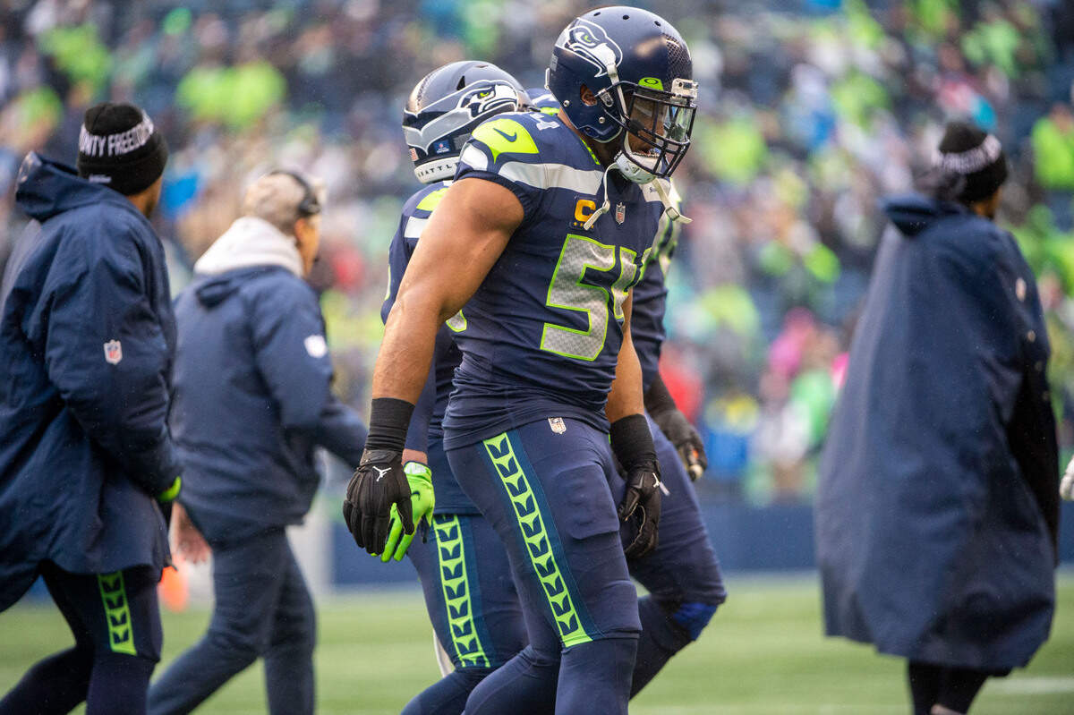 Seattle Seahawks middle linebacker Bobby Wagner (54) walks off the field after suffering an injury in the first quarter of an NFL game against the Detroit Lions on Sunday, Jan. 2, 2022, at Lumen Field in Seattle.