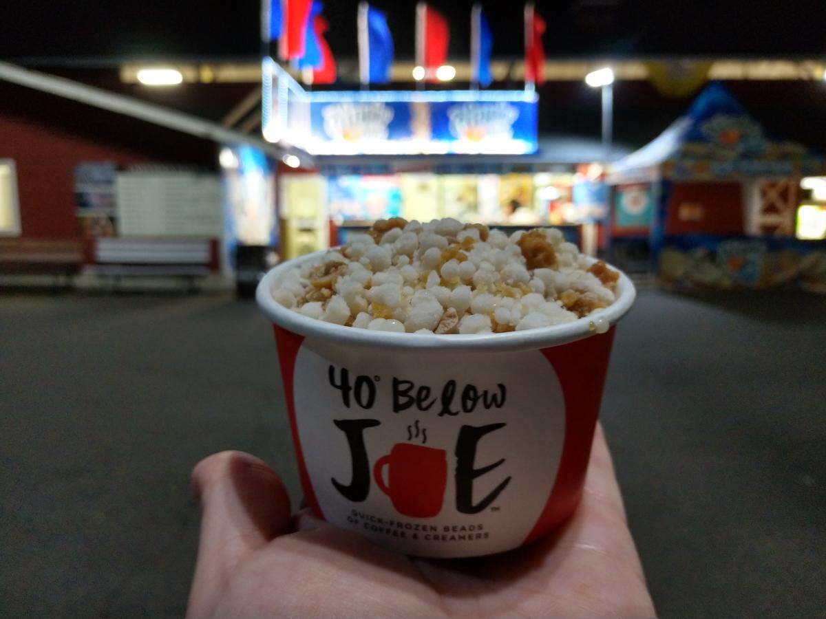 Frozen coffee, chilled to 40 degrees below zero, is a new gluten-and-dairy-free treat from the Dippin’ Dots booth operated by Young Life near the dairy barns at the Washington State Fair.