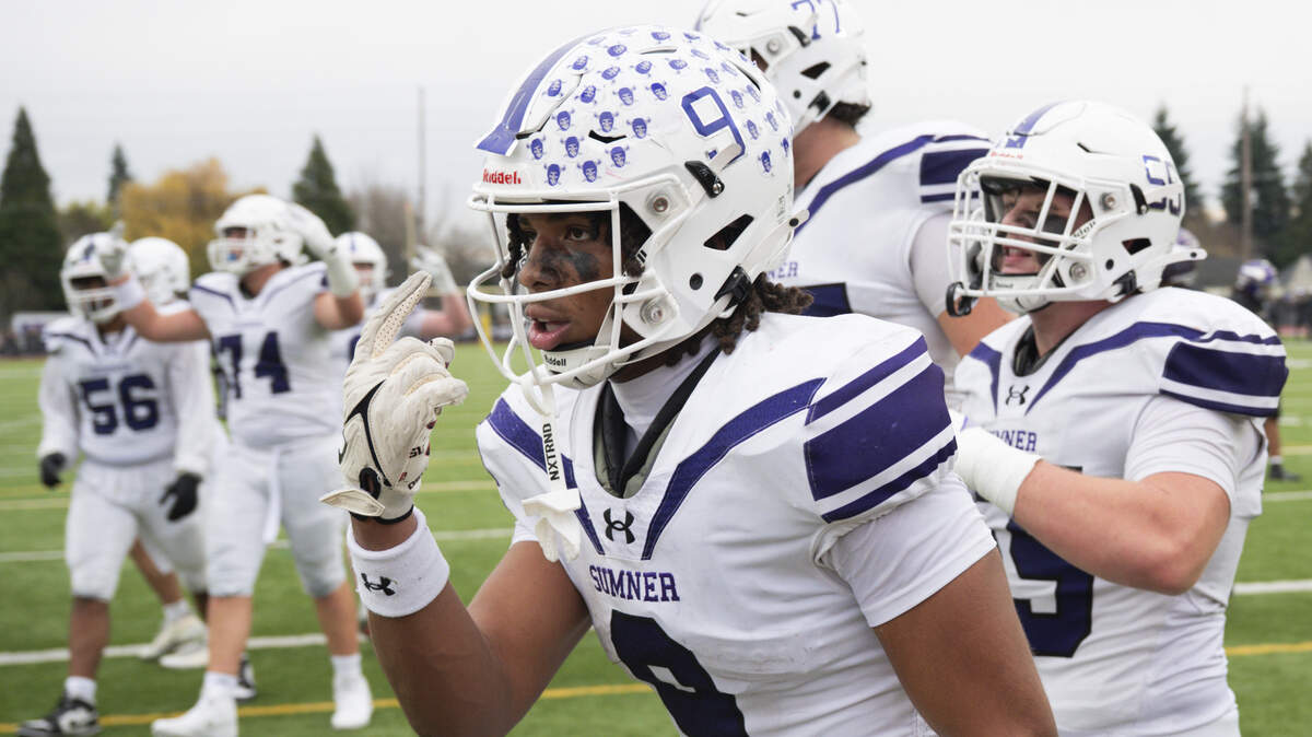 Sumner running back Lance McGee (9) reacts after his fourth touchdown against Puyallup during the second half of the 4A state semifinal game at Sparks Stadium, on Saturday, Nov. 29, 2025 in Puyallup, Wash.