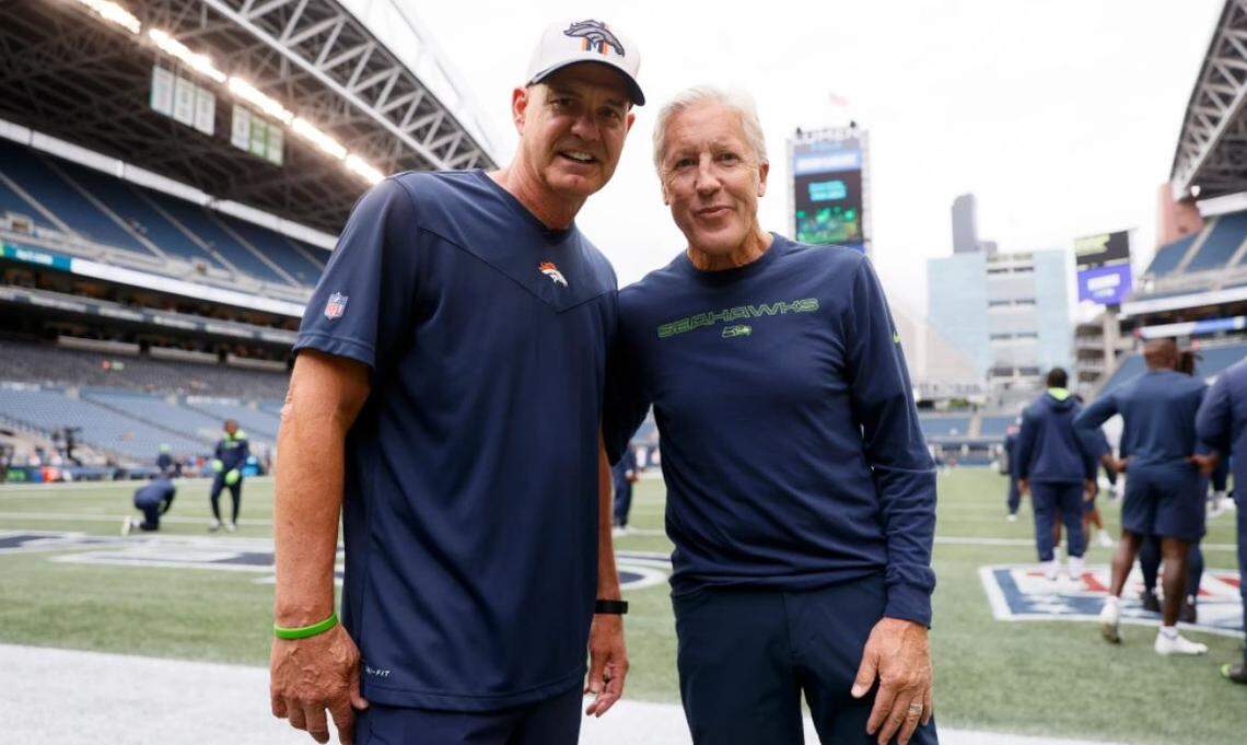 Denver Broncos defensive coordinator Ed Donatell, left, and Seahawks coach Pete Carroll first coached together at the University of the Pacific in 1983. The Seahawks have reportedly asked the Broncos for permission to interview Donatell for Seattle’s vacant defensive-coordinator position. Carroll fired Ken Norton Jr. from that job Tuesday.