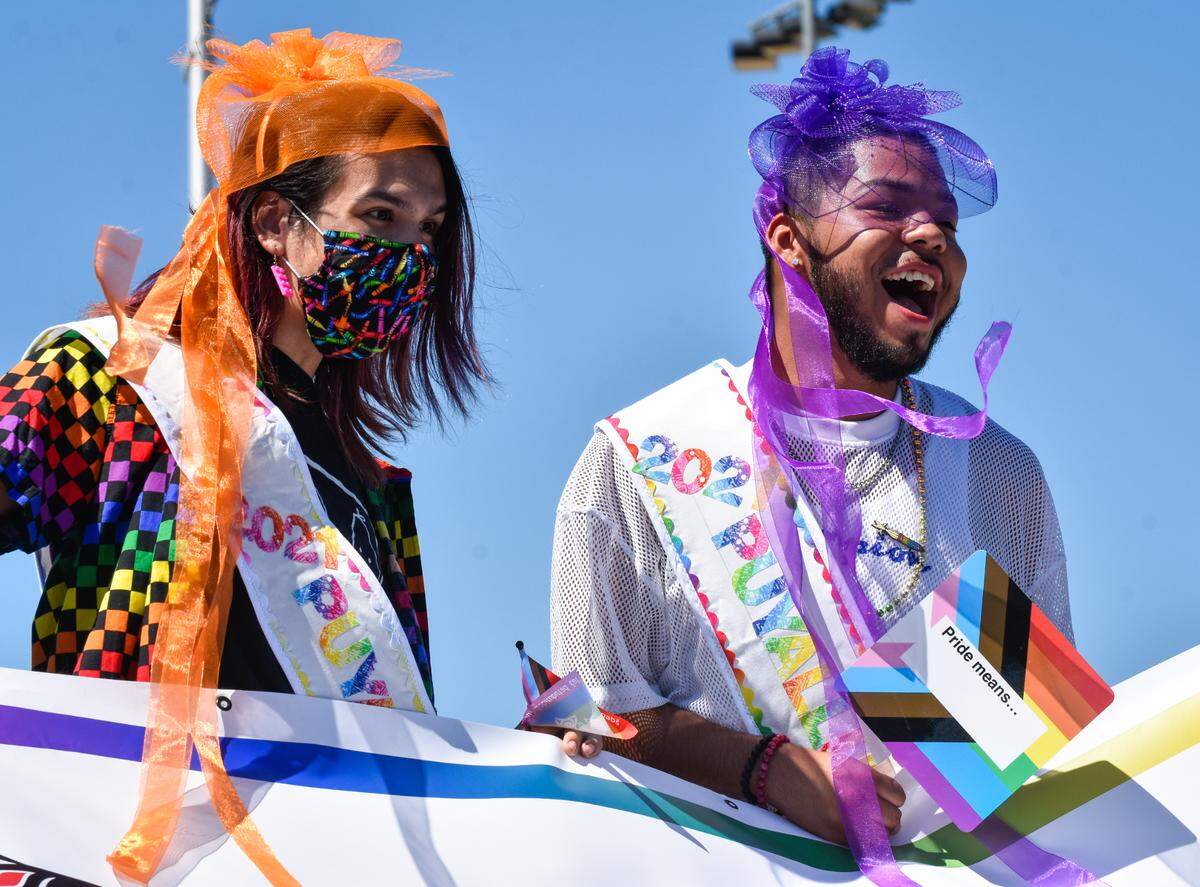 Puyallup tribal member Araquin Boome, left, and Elijah Campbell from the Ho-Chunk Nation of Wisconsin pose for a photo at The Puyallup Tribe of Indians’ third annual Pride Celebration Sunday, July 25, at Chief Leschi Schools in Tacoma. The pair were among five event attendees chosen as Puyallup Pride Royalty.