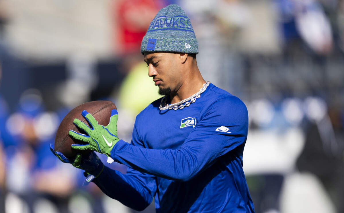 Seattle Seahawks wide receiver Jaxon Smith-Njigba (11) warms up before the game against the Tampa Bay Buccaneers at Lumen Field, on Sunday, Oct. 5, 2025, in Seattle.