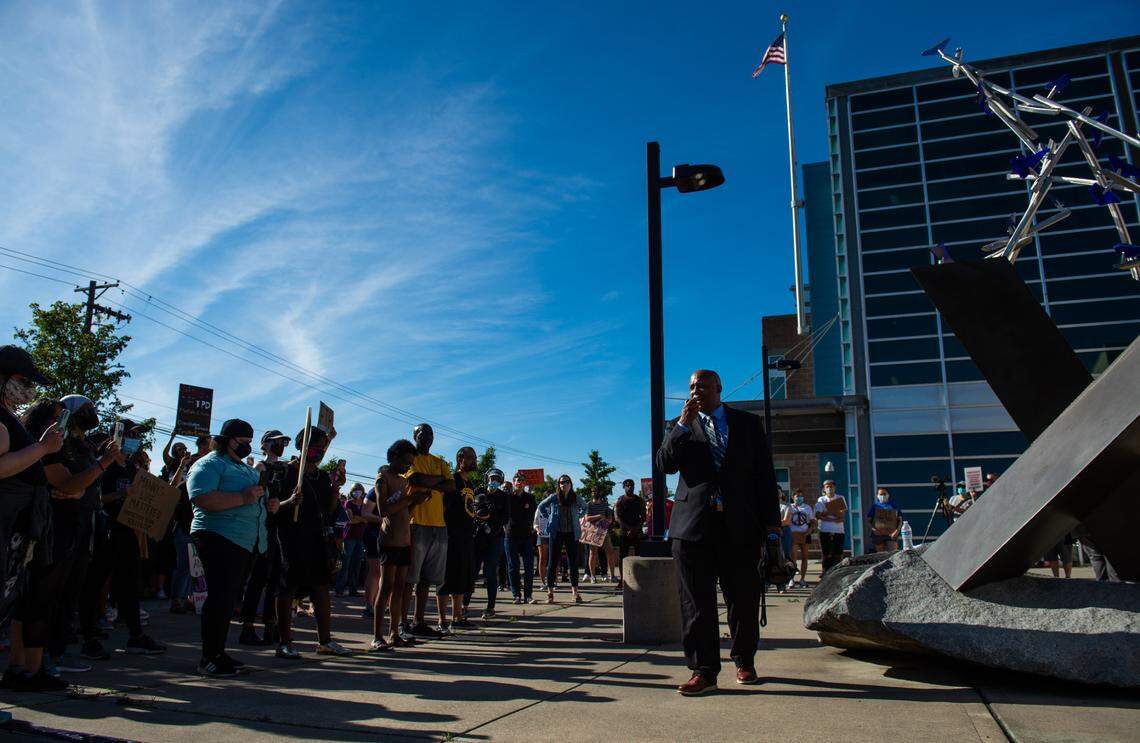 Attorney James Bible speaks to the crowd as they protest outside the Tacoma Police Headquarters on South Pine Street against the killing of Manuel Ellis in Tacoma on June 18, 2020.