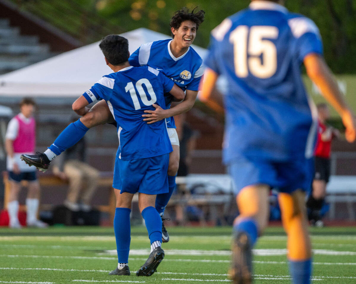 Tahoma’s Ignacio Brandan celebrates with Pablo Flores after Flores scored in the first half of the 4A West Central/Southwest district soccer championship game against Bellarmine Prep on Thursday, May 11, 2023, at Sparks Stadium in Puyallup, Wash.