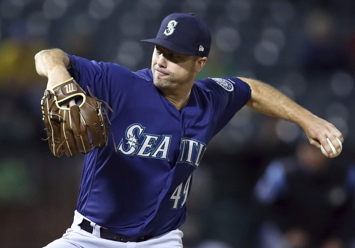 Seattle Mariners pitcher Wade LeBlanc works against the Oakland Athletics during the second inning of a baseball game Thursday, Aug. 30, 2018, in Oakland, Calif. (AP Photo/Ben Margot)