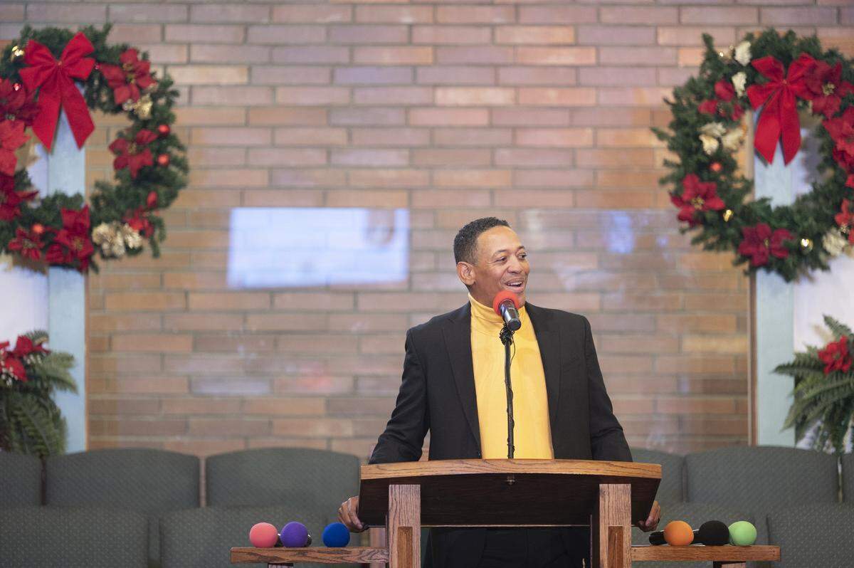 John E. Montgomery, son of Bishop Curtis E. Montgomery, welcomes guests to an honorary street renaming ceremony for Curtis E. Montgomery Street on Saturday, Dec. 27, 2025, at Greater Christ Temple Church in Tacoma, Wash.