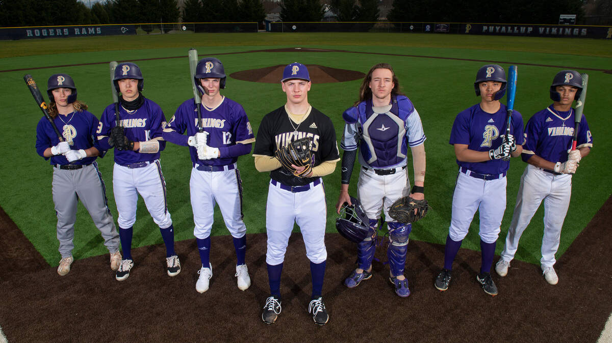 The talent-rich Puyallup Vikings baseball team is expected to contend (as usual) for the 4A SPSL title, led by senior shortstop Drake Anderson (from left), junior outfielder Noah Fields, freshman outfielder Brett Ellingson, junior pitcher Wyatt Jones, senior catcher Willis Crenshaw, senior first baseman Jacob Yang and freshman outfielder Donte Grant. They are shown before practice at Heritage Recreation Center in Puyallup on Thursday, April 1, 2021.