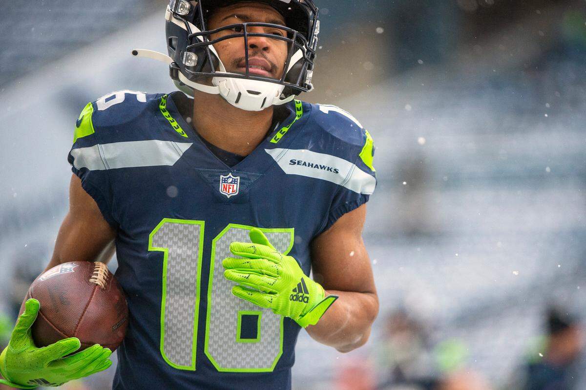 Seattle Seahawks wide receiver Tyler Lockett (16) warms up prior to the start of an NFL game against the Chicago Bears on Sunday afternoon at Lumen Field in Seattle.