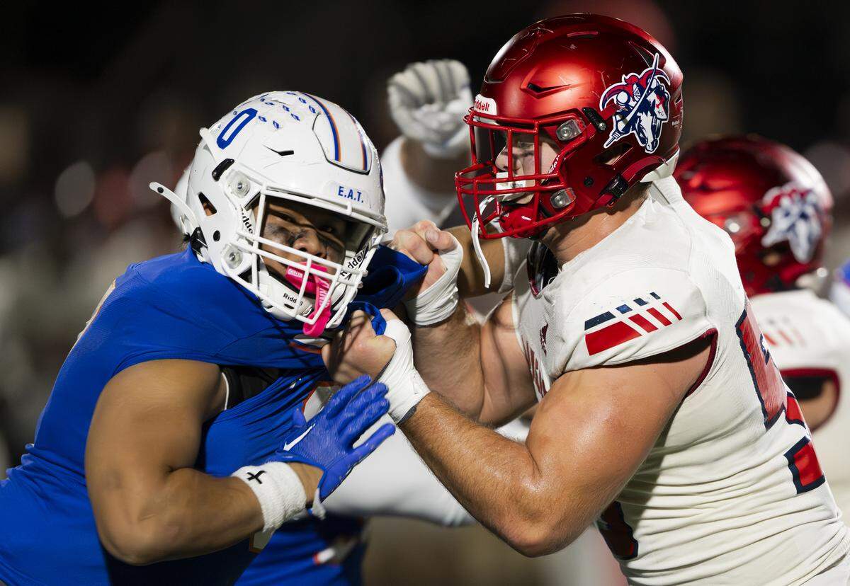Graham Kapowsin defensive lineman Jeremiah Leumuava (0) works against Kennedy Catholic offensive lineman Derek Colman-Brusa (55) during the second half of the opening round 4A state tournament game at Art Crate Field, on Saturday, Nov. 15, 2025, in Spanaway, Wash.