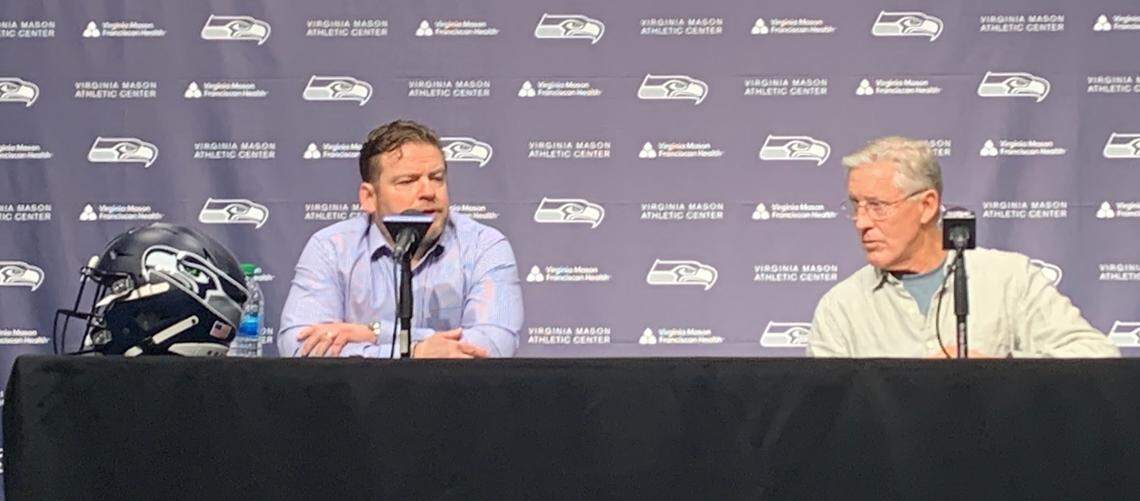 General manager John Schneider (left) and coach Pete Carroll talked about the Seahawks’ mammoth trade of Russell Wilson to the Denver Broncos at Seahawks headquarters in Renton on March 16, 2022.