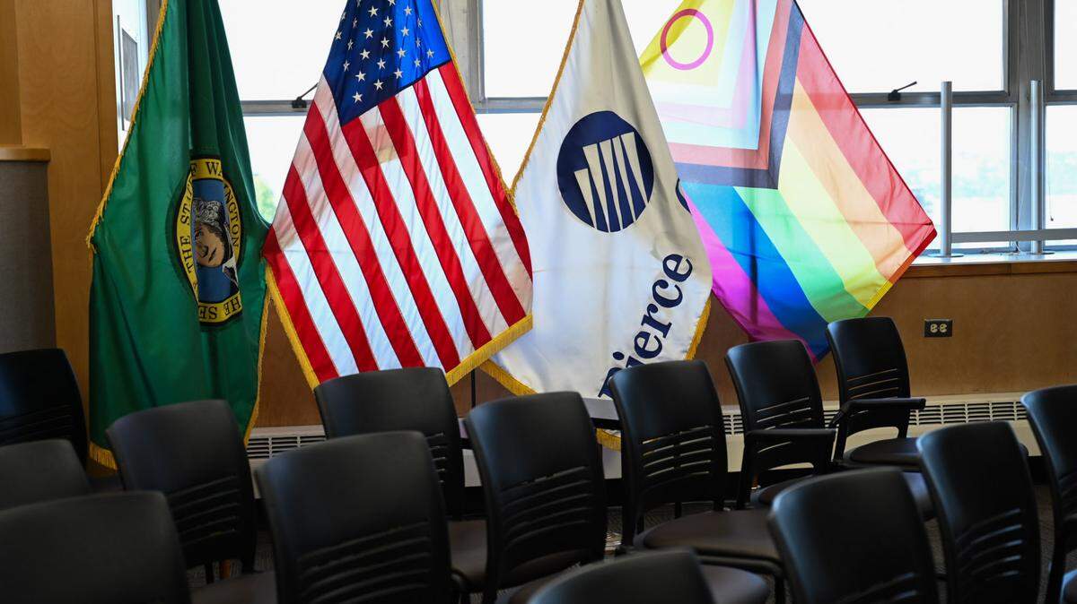 A Pride flag is posted among others inside the Pierce County Council Chambers as seen on Wednesday, July 3, 2024 in Tacoma.