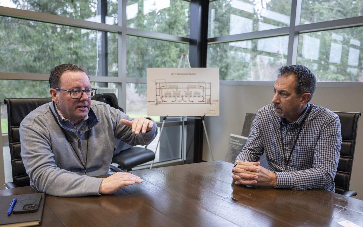 Tom Pierson, left, CEO of the Tacoma Pierce County Chambers of Commerce, and Dave Vranizan, Centeris vice president of leasing and operations, speak with The News Tribune on Friday, Feb. 13, 2026, at the SH1 Data Center in Puyallup, Wash.