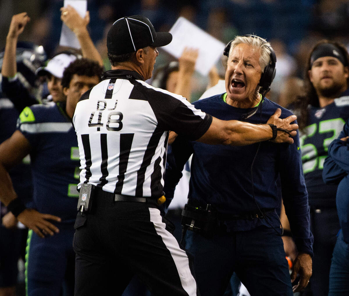 Seattle Seahawks head coach Pete Carroll argues with an official during the game. The Seattle Seahawks played the Denver Broncos in a NFL preseason game at CenturyLink Field in Seattle, Wash., on Thursday, Aug. 8, 2019.