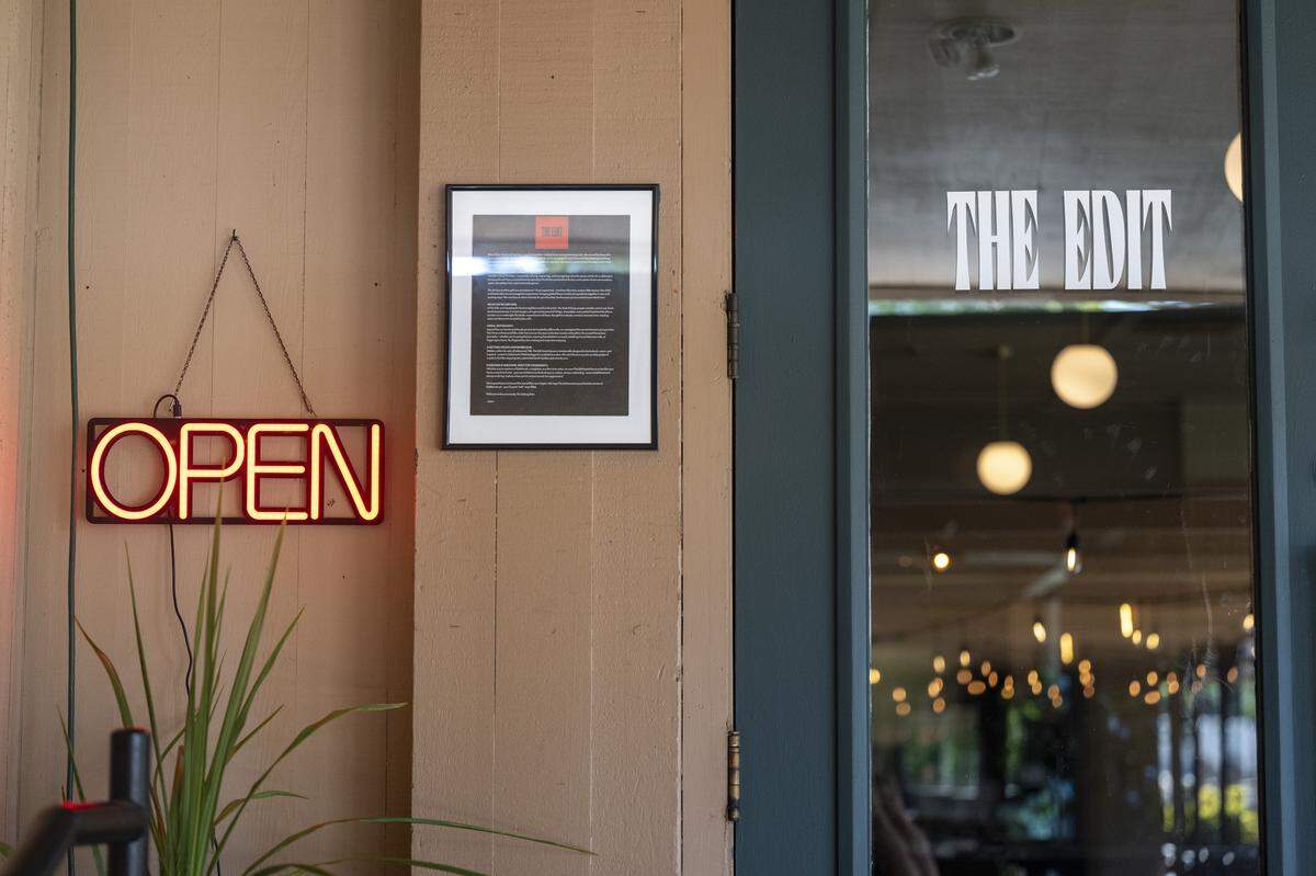 A sign marks a door to The Edit Social House on Thursday, May 21, 2026, near the entrance of the Oakbrook Golf Club in Lakewood, Wash.