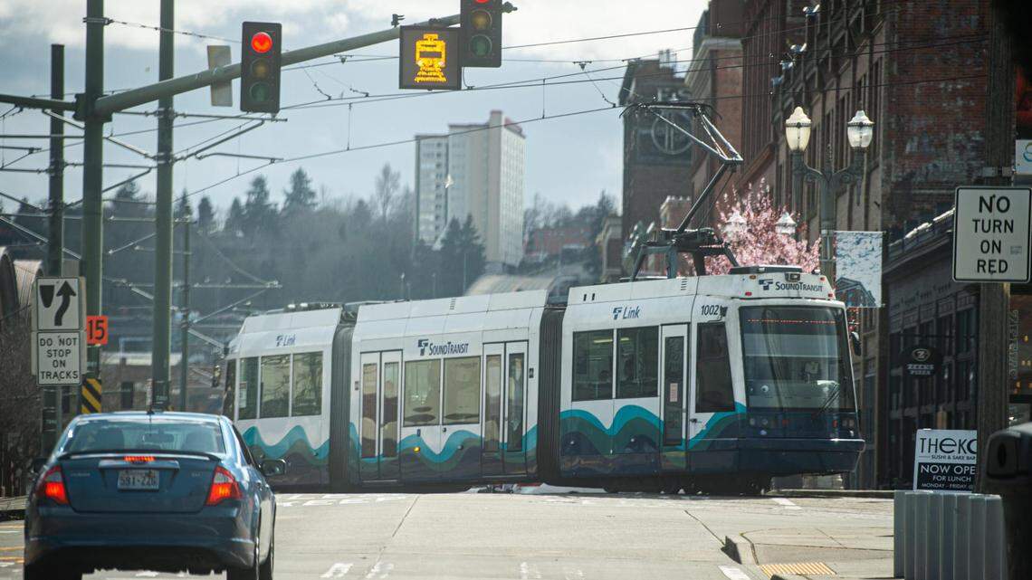 The Tacoma Link Light Rail passes onto Pacific Avenue in Tacoma on Monday, March 22, 2021.