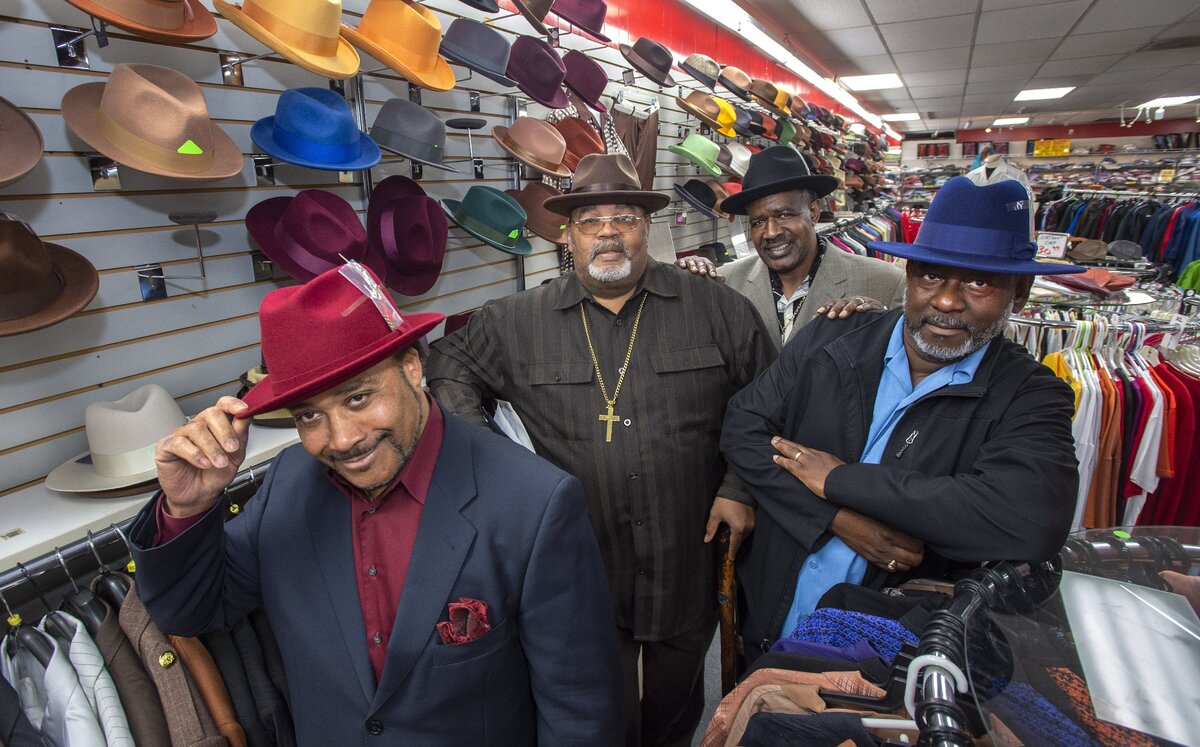 “You can’t find styles like this anywhere else. It’s unique,” said Bishop Prentis Johnson, left, as he and fellow members of the Tacoma Ministerial Alliance modeled hats for sale at Mr. Mac LTD on Wednesday, Oct. 24, 2018. The Alliance purchased the iconic men’s clothier located on Martin Luther King Jr. Way in the Hilltop neighborhood to preserve a legacy and help fund its work in the community. From left: Prentis, former TMA secretary; Dr. Arthur Banks, former executive director; Pastor Gregory Christopher former president; and the Rev. Dr. Michael Purter, former vice president.