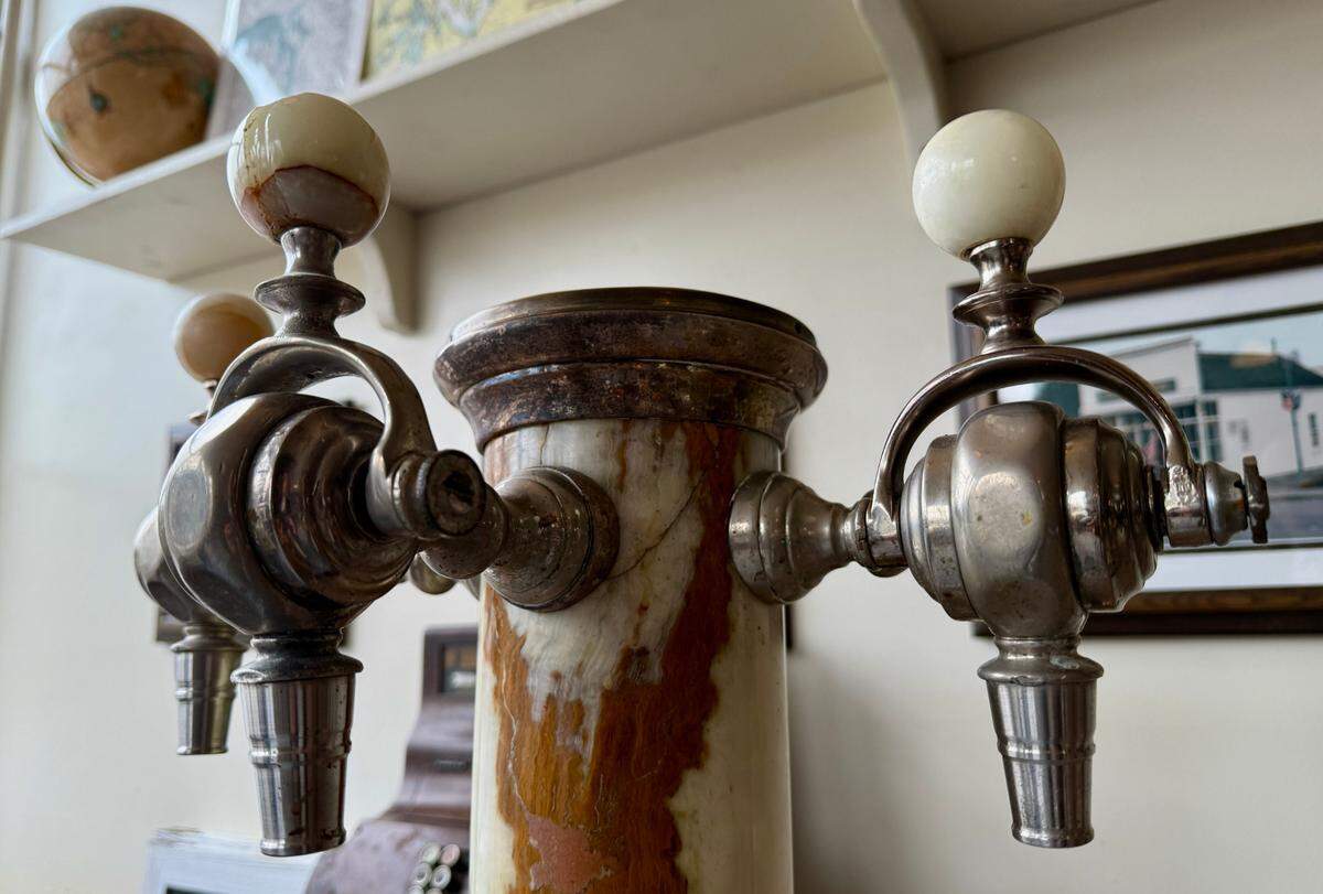The soda fountain, believed to have been manufactured in the early 1900s by Chicago-based Bastian-Blessing, features a marble fixture, sturdy spigots and a marble bar-top.
