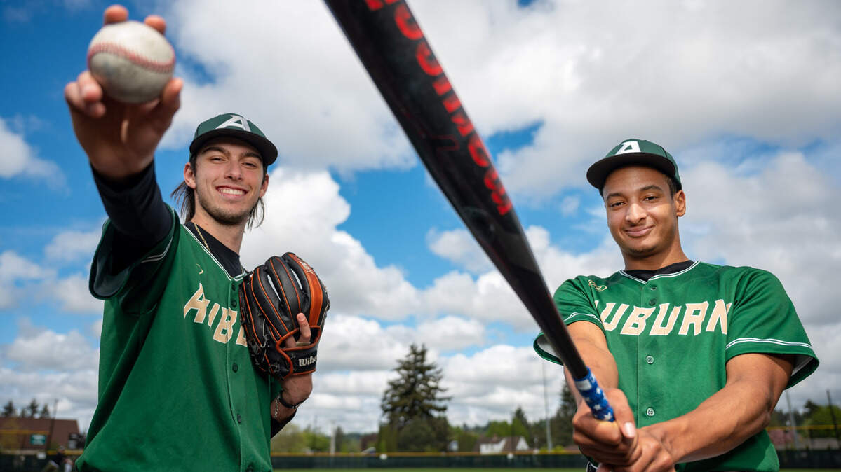Auburn pitcher Colton Anardi (left) and centerfielder Amari Goodfellow pose for a portrait at Auburn High School on Friday, May 6, 2022.