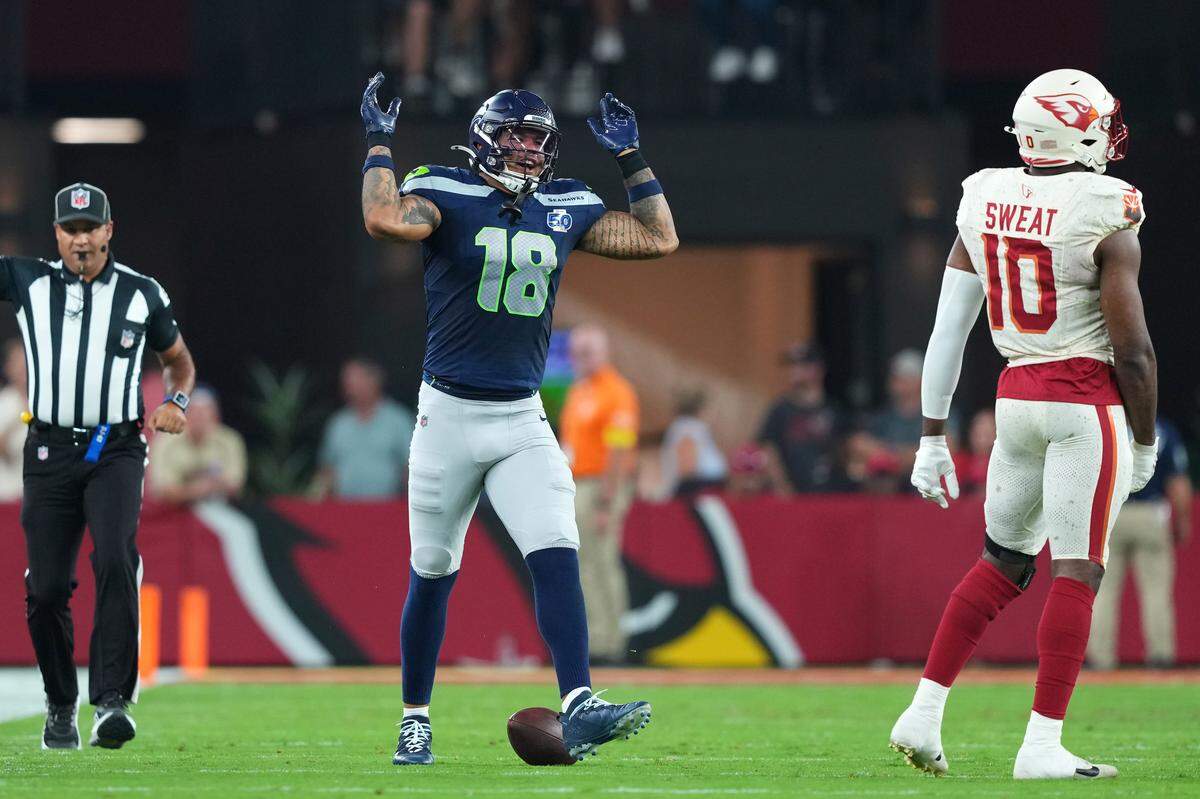 Seattle Seahawks tight end Elijah Arroyo (18) reacts after a catch against the Arizona Cardinals in the second quarter at State Farm Stadium. Mandatory Credit: Joe Camporeale-Imagn Images