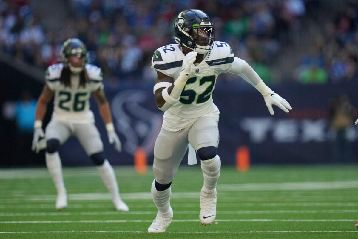 Seattle Seahawks defensive end Darrell Taylor (52) during the first half of an NFL football game against the Houston Texans, Sunday, Dec. 12, 2021, in Houston. (AP Photo/Eric Christian Smith)