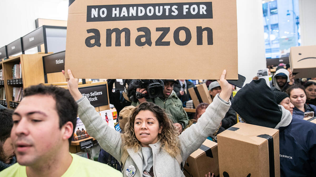 A protest against Amazon’s second headquarters at an Amazon store in New York, Nov. 26, 2018. The political opposition that prompted Amazon to walk away from building a corporate headquarters in New York City featured a touchstone of the progressives economic agenda: ending tax policies that unfairly reward and pamper the wealthy.