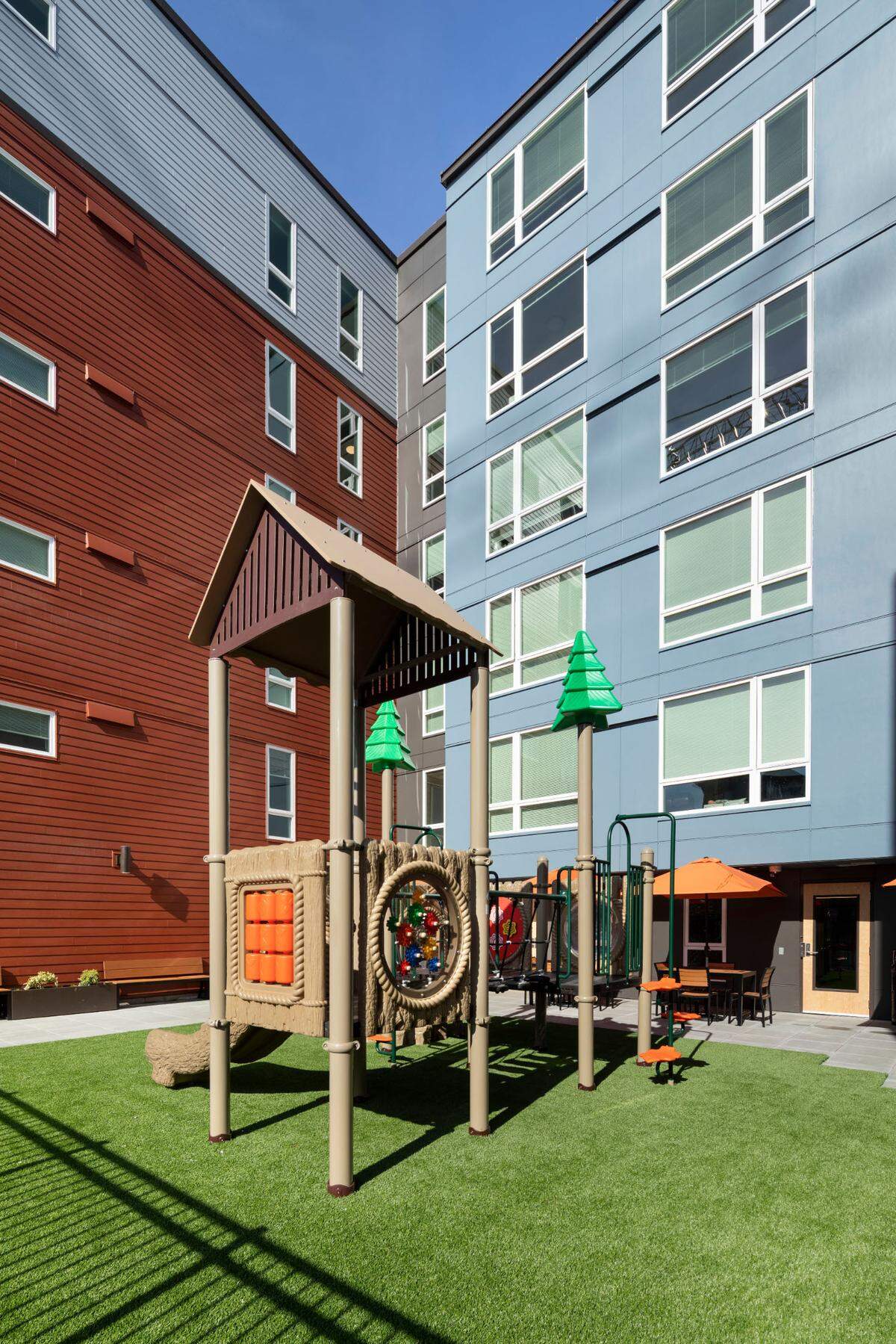 A children’s play area at the newly finished $23 million YWCA Pierce County Dorothy Height Apartments affordable housing development on Broadway.
