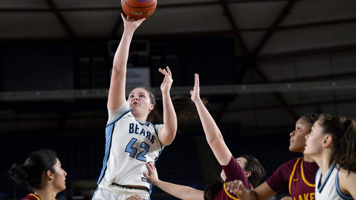 Central Valley forward Brynn McGaughy (42) attempts a shot as Lakeside point guard Helena Christofilis (12) defends during the fourth quarter of the Class 3A state championship game at the Tacoma Dome on Saturday, March 8, 2025, in Tacoma, Wash.