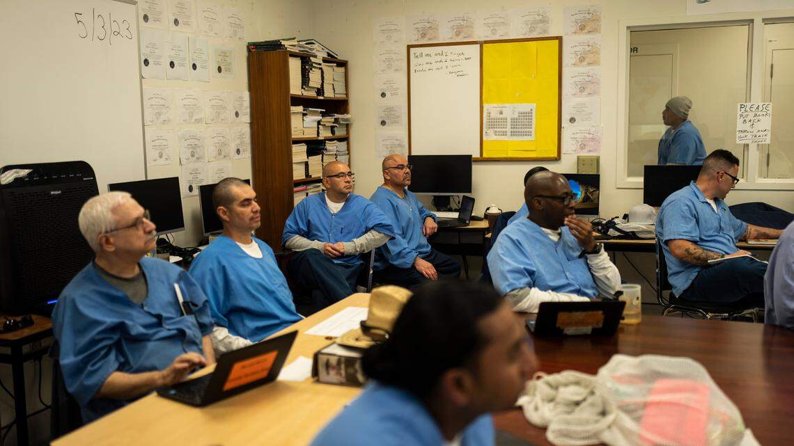 Prisoner-students majoring communications through the Transforming Outcomes Project at Sacramento State (TOPSS) sit in a classroom at Folsom State Prison in Folsom, Calif., Wednesday, May 3, 2023. Congress voted to lift a ban on Pell Grants for prisoners in 2020, and since then about 130 experimental programs have been running, like the one at Folsom. In Washington, state lawmakers are currently considering a bill that would allow incarcerated individuals to vote. (AP Photo/Jae C. Hong)