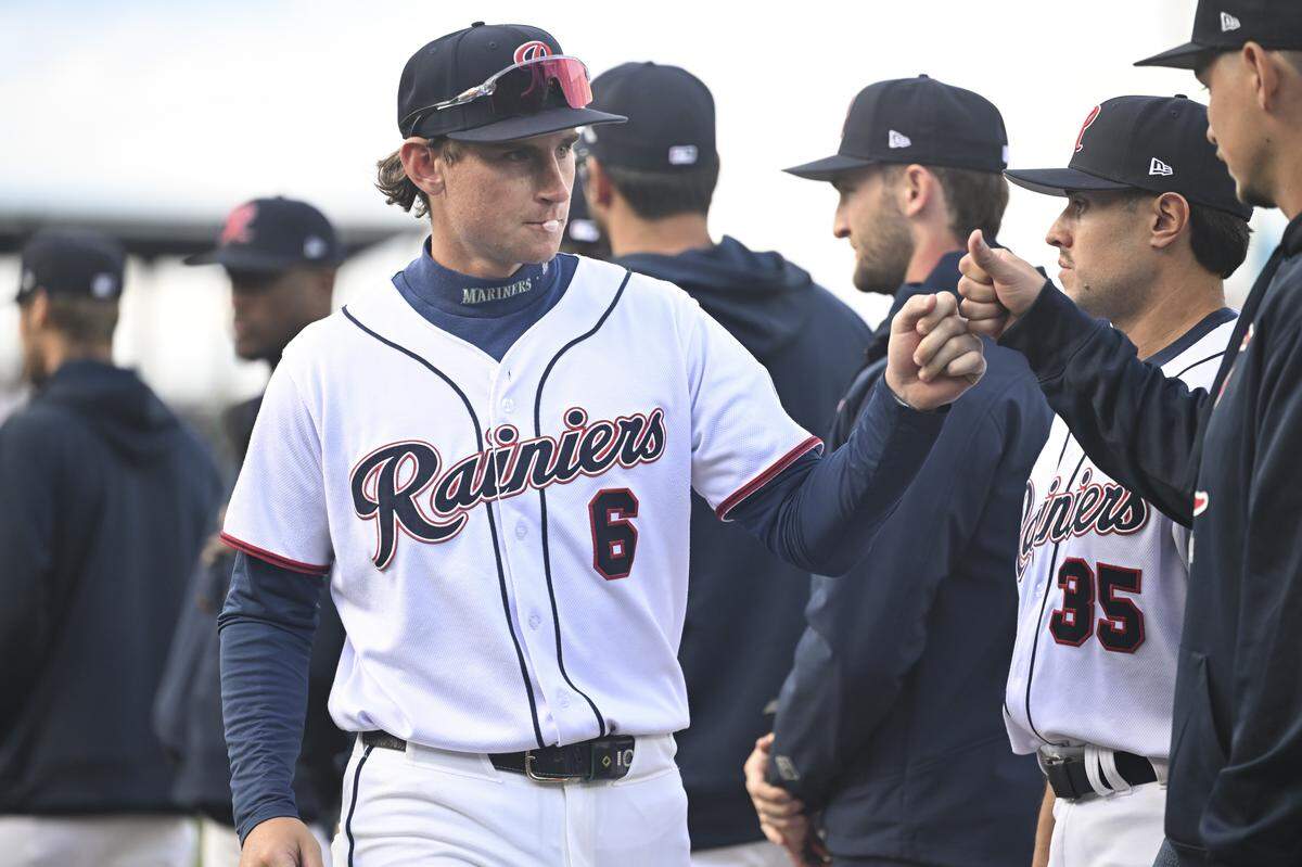 Tacoma Rainiers shortstop Colt Emerson (6) takes part in pre-game introductions before a game against the El Paso Chihuahuas on Tuesday, March 31, 2026, at Cheney Stadium in Tacoma, Wash.