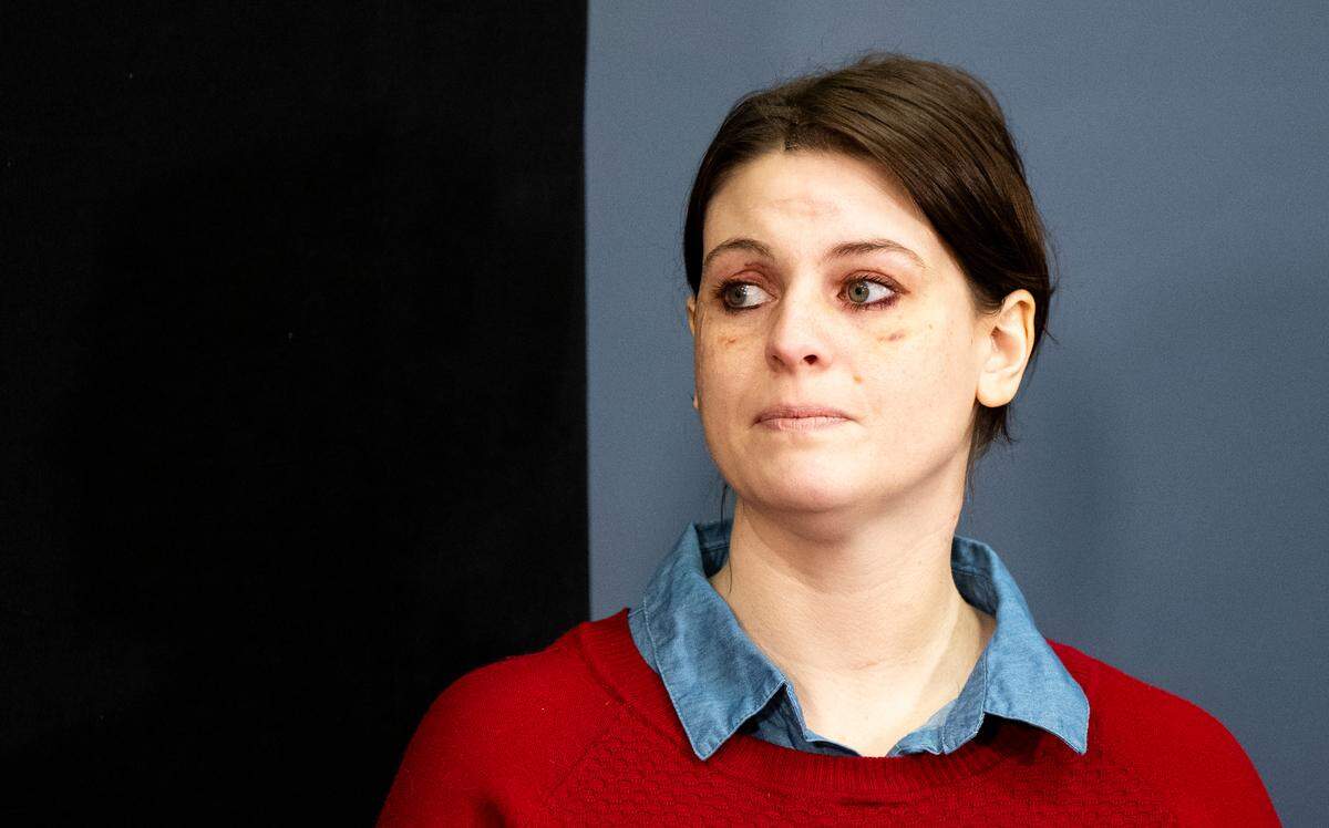 The victim of a stabbing reads a statement during a press conference on the stabbing that took place on Feb. 10 at Point Defiance Park, at Tacoma Police Department headquarters, on Wednesday, Feb. 21, 2024 in Tacoma, Washington.