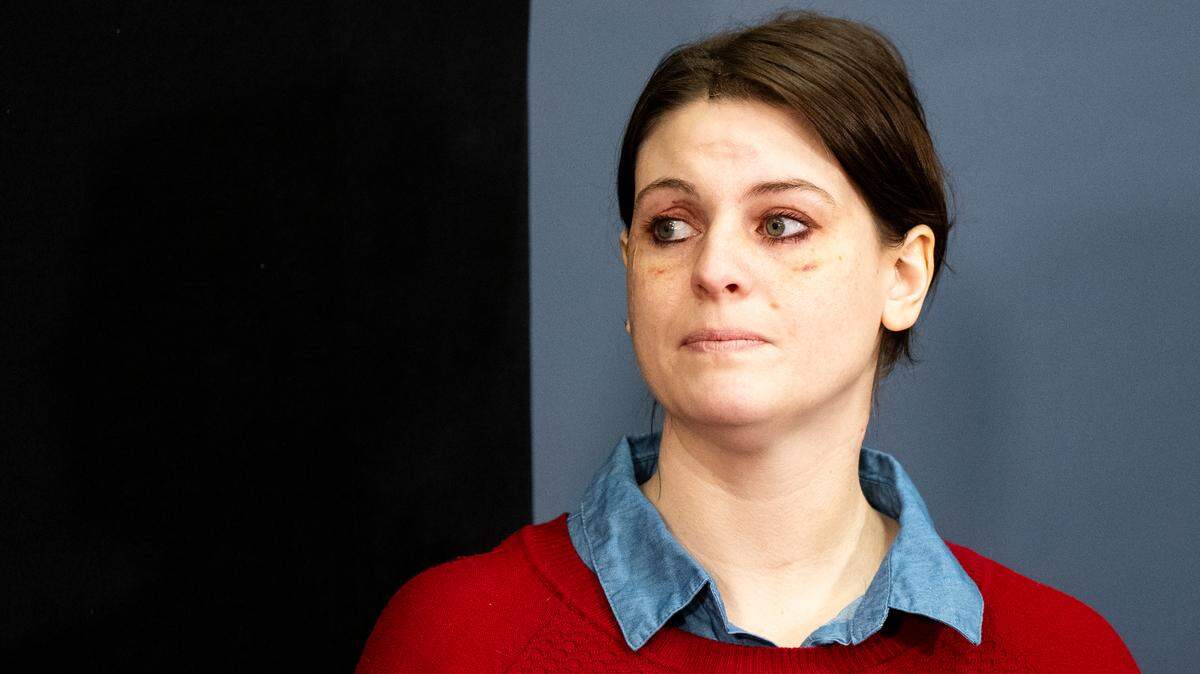 The victim of a stabbing reads a statement during a press conference on the stabbing that took place on Feb. 10 at Point Defiance Park, at Tacoma Police Department headquarters, on Wednesday, Feb. 21, 2024 in Tacoma, Washington.