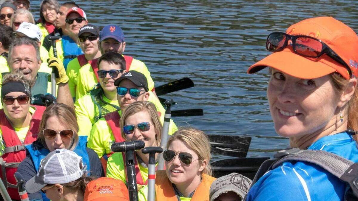 Jen O'Hare coaching the Gig Harbor dragon boat team during the 2018 Paddlers Cup at Skansie Park.