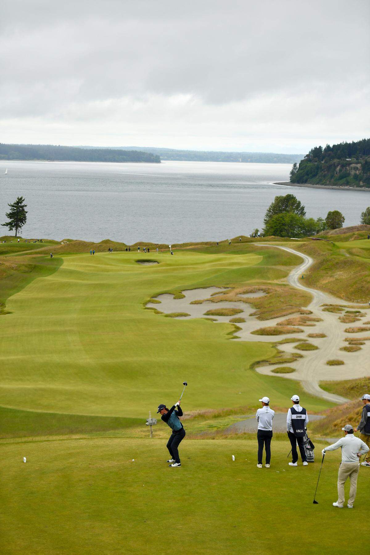 David Ford plays his tee shot at the fifth hole during the second round of stroke play at the 2021 U.S. Amateur Four-Ball at Chambers Bay in University Place, Wash. on Sunday, May 23, 2021. (Robert Beck/USGA)
