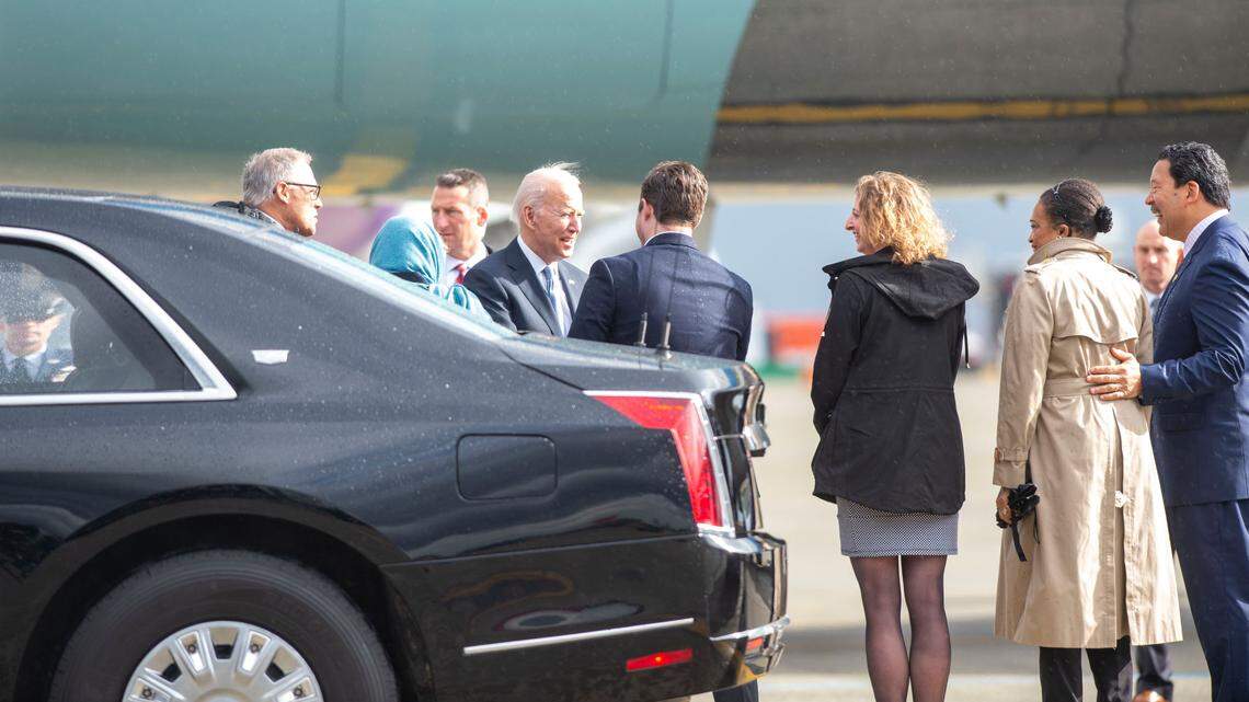 President Joe Biden shakes hands with Jake Simpson, the mayor of SeaTac, after leaving Air Force One after it arrived at SeaTac International Airport on Thursday, April 21, 2022, in Seattle.