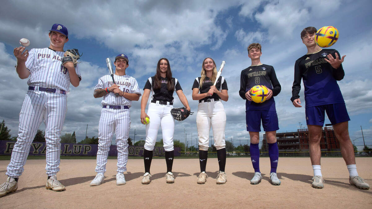Puyallup baseball pitcher Hunter Grasser and catcher Kai Halstead, softball pitcher Lauryn Krick and third baseman Kyra Smith, and soccer midfielder Dean Williams and defender Brady Anderson will take their Vikings teams into this weekend’s state playoffs. They are shown at Puyallup High School in Puyallup, Washington, on Tuesday, May 23, 2023.