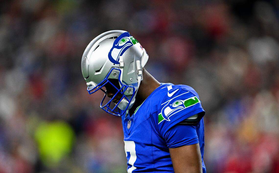 Seattle Seahawks quarterback Geno Smith (7) walks off the field after failing to convert during the third quarter of the game against the San Francisco 49ers at Lumen Field, on Thursday, Oct. 10, 2024, in Seattle, Wash.