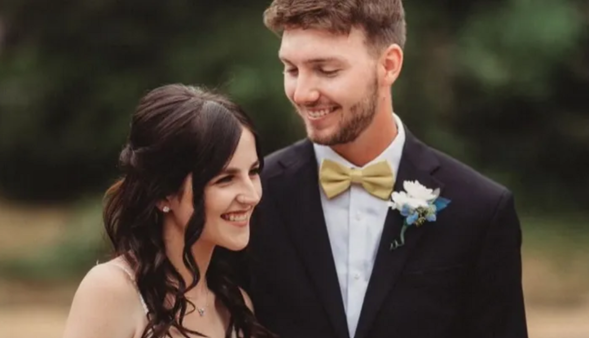Josh Gyer, right, is pictured in a photograph with his wife, whom he married in August 2022.